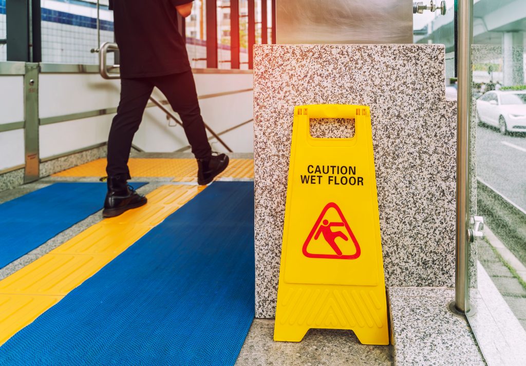 Alt Text: Slip testing on a commercial floor to evaluate changing DCOF values